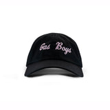 Black baseball cap with pink "Gas Boys" embroidered text, curved brim and structured design