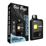 Black Gas Boys disposable vape device with Northern Lights strain, 3000mg, against starry night background with forest silhouette.