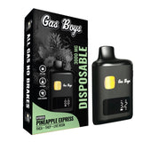 Gas Boys Pineapple Express hybrid disposable vape device, black box with green accents, 3000mg THC vape pen beside packaging.